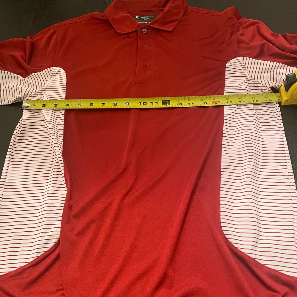 Dry fit golf shirt with club logo on sleeve